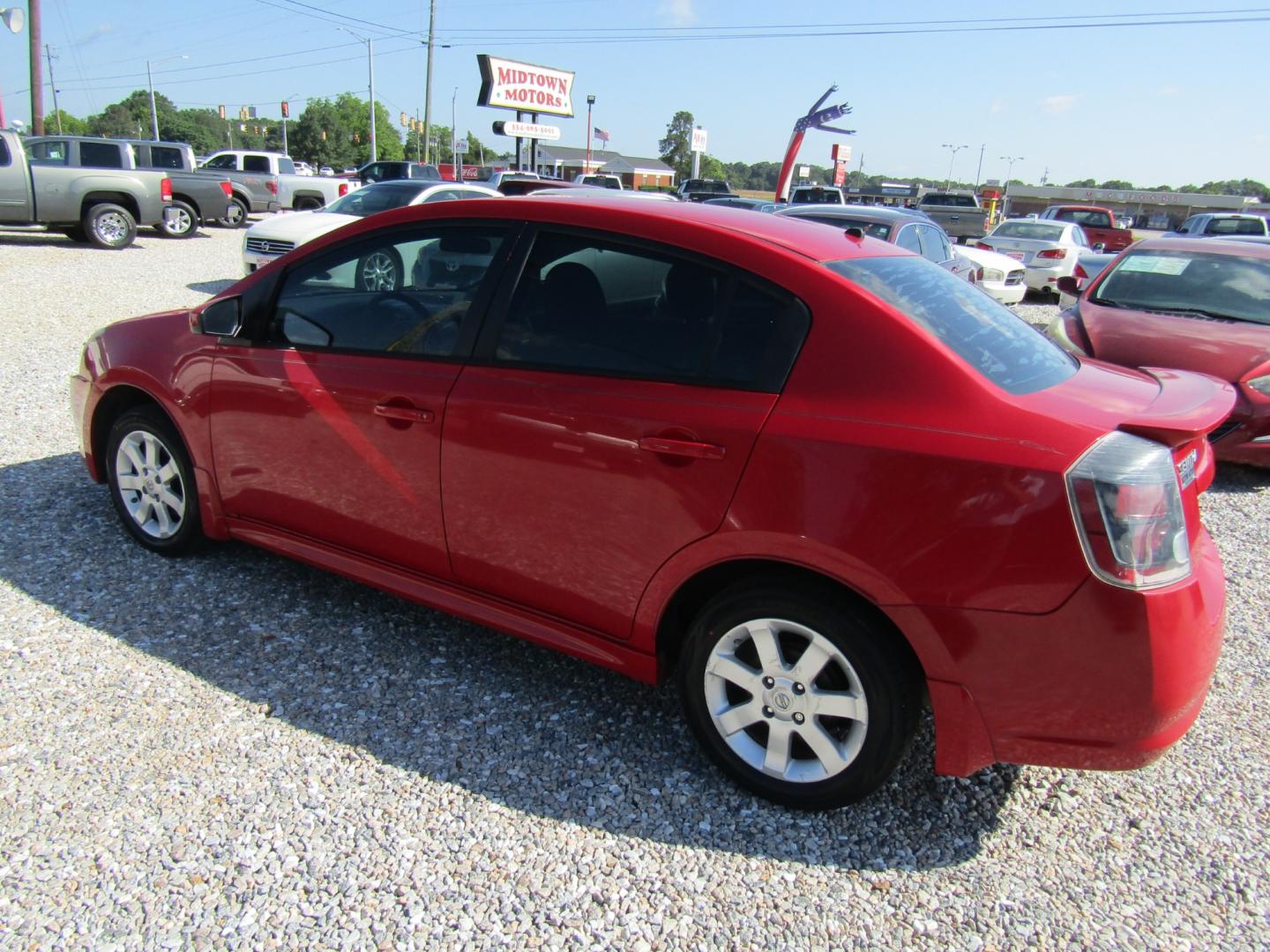 2012 Red /Gray Nissan Sentra 2.0 (3N1AB6AP4CL) with an 2.0L L4 DOHC 16V engine, Automatic transmission, located at 15016 S Hwy 231, Midland City, AL, 36350, (334) 983-3001, 31.306210, -85.495277 - Photo#5